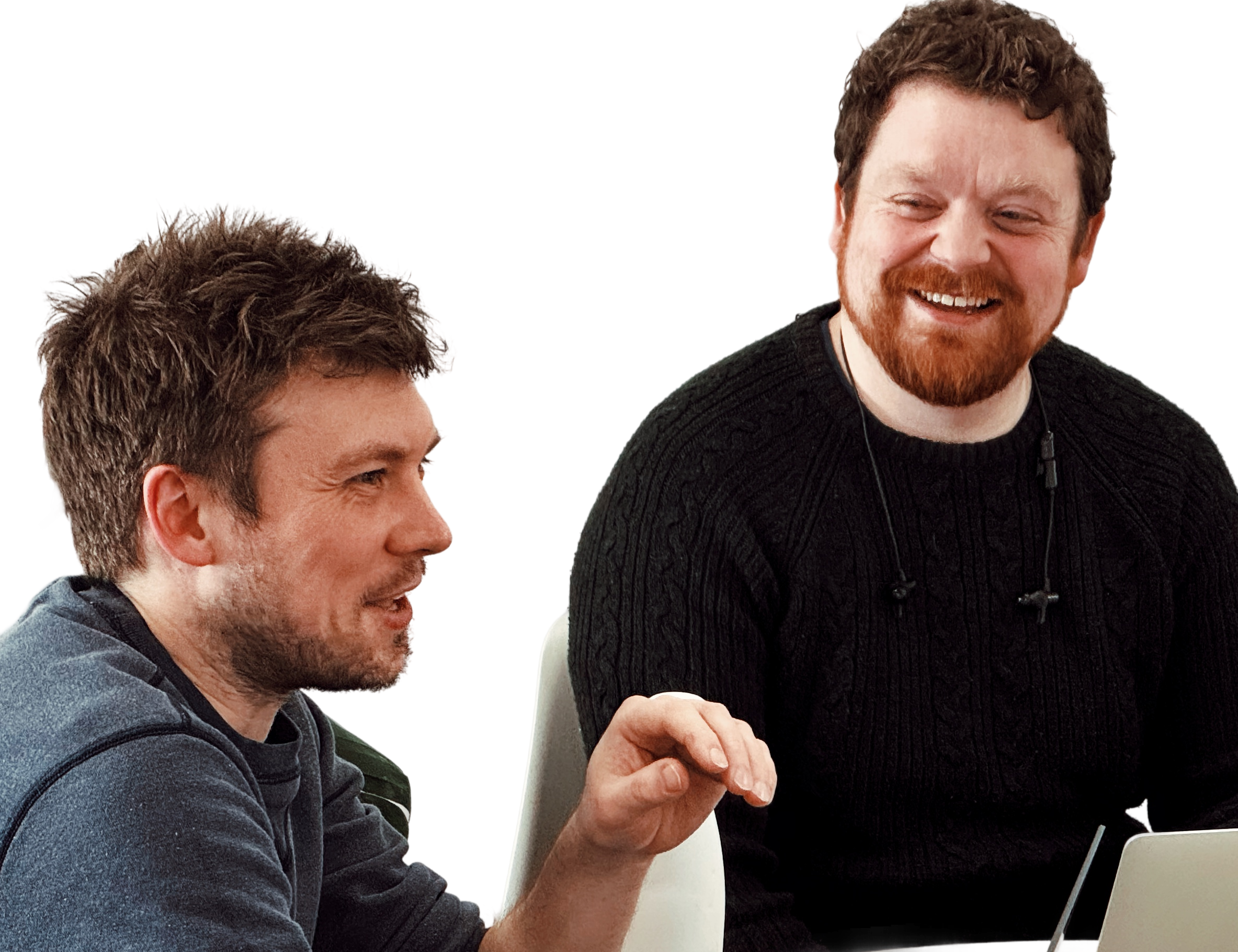 Two members of the Rofinery team laughing together